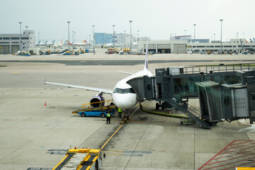 Exterior architecture buildings of Hongkong international airport and Aircraft boeing stop waiting...