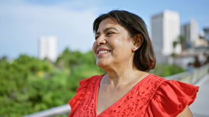 Smiling woman outdoors - Powered by Adobe