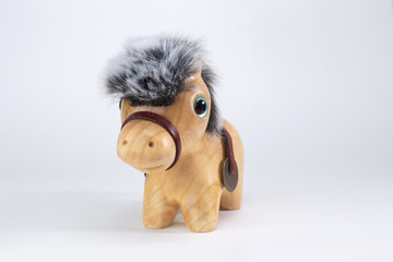 Woodcarving Chinese sign horse isolated on white