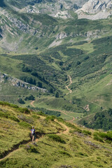 Woman Hiking by Calabazosa Lake, Somiedo Park, Summer in Asturias, Spain