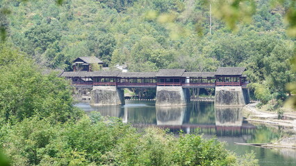 Fototapeta premium The old arched stone bridge view located in the countryside of the China 