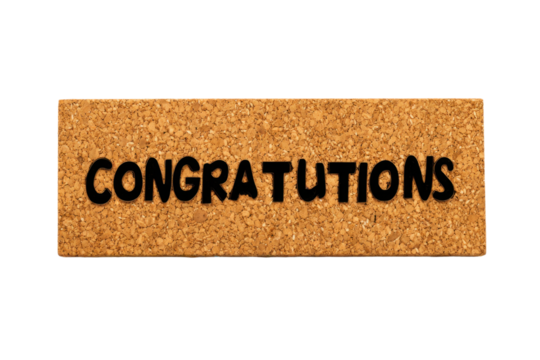 the word congratulations on a cork notice board