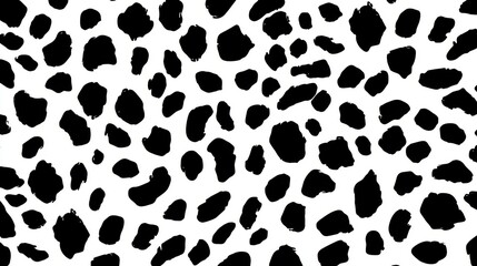 A vibrant black and white spotted pattern features various irregular shapes scattered across a bright surface, creating a lively and geometric design that draws attention.