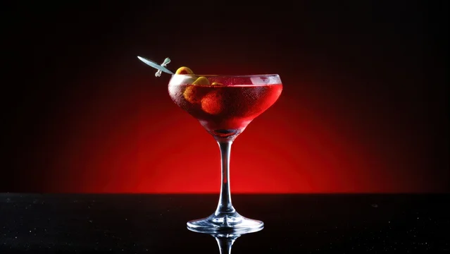 Chilled Red Cocktail in Glass with Dramatic Backlight