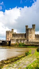 Fototapeta premium Medieval castle by a river
