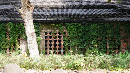 The old china factory view with the red bricks and ivy covered in China

