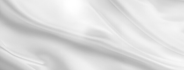 Smooth white silk fabric with soft folds and elegant texture