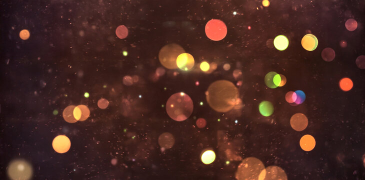 Abstract glowing bokeh lights on dark background - Powered by Adobe