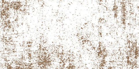 Rusty iron and old brown paper create a grunge pattern on a textured metal surface