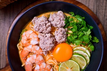 Homemade instant noodles soup with shrimps minced pork and eggs	
