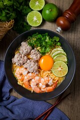 Homemade instant noodles soup with shrimps minced pork and eggs	