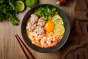 Homemade instant noodles soup with shrimps minced pork and eggs	