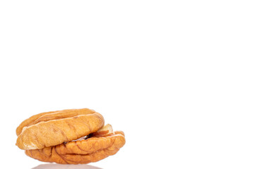 Peeled pecan nuts isolated on white background, close-up.