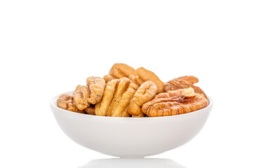 Peeled pecan nuts isolated on white background, close-up.
