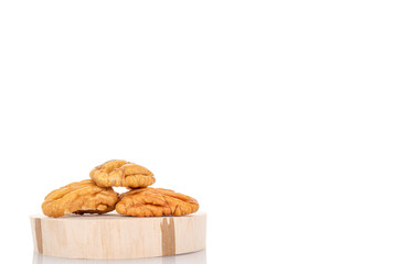 Peeled pecan nuts isolated on white background, close-up.
