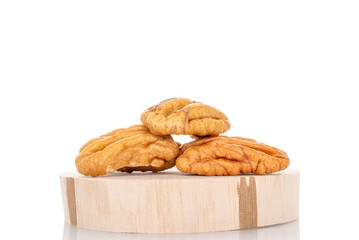 Peeled pecan nuts isolated on white background, close-up.