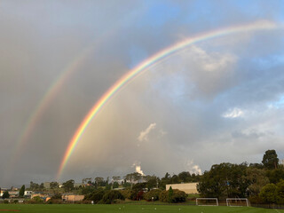 Magnificent double rainbows stretching across the sky