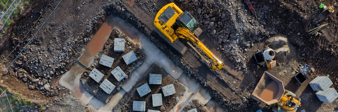Construction building site aerial view showing materials