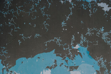 Long cracks snaked across the walls. Cracked concrete surface