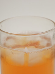 Iced tea in a glass, blurry and selective focus