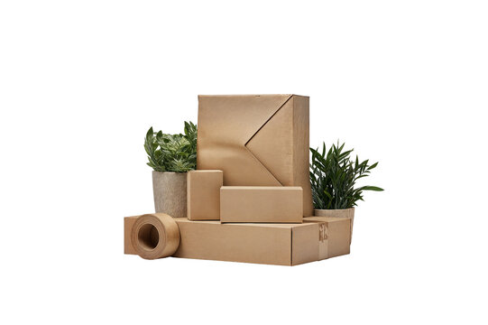 Stock photo of brown cardboard boxes plants tape for shipping and moving on transparent background
