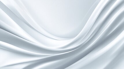 Obraz premium A white fabric undulates softly, creating elegant folds that evoke a sense of tranquility. The texture appears smooth, inviting a serene ambiance in the setting.