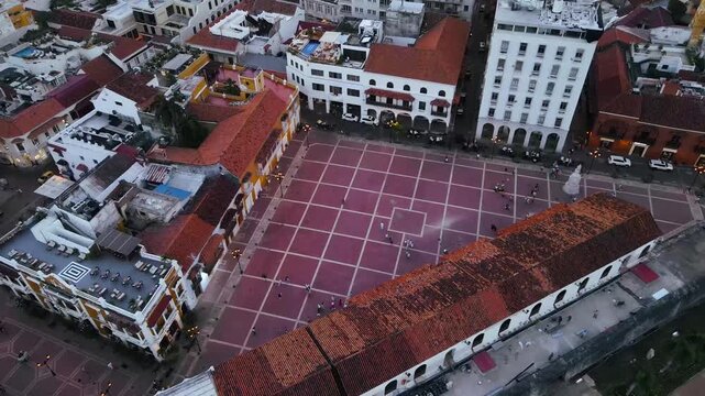 Aerial view of Plaza de la Aduana and the nearby historic buildings in Cartagena, Colombia at sunset