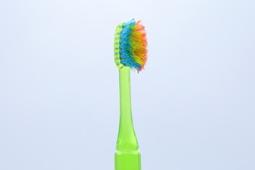 Old dirty worn used toothbrush. Close up.