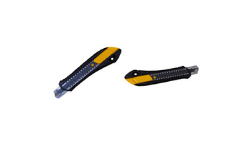 stationery knives isolated, retractable construction knife on a white background