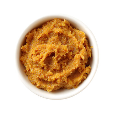 Bowl of Miso Paste : Close - up overhead shot of flavorful fermented soybean paste showcasing its rich texture and vibrant color