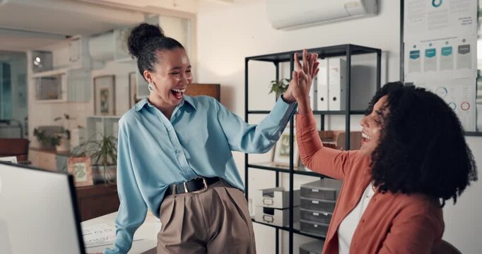 Women, high five and excited with computer at startup, motivation and success at media company. People, partner and celebration with praise, congratulations or happy for achievement at digital agency
