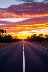 Fototapeta premium Asphalt Road Sunset Western Australia Orange Pink Cloudscape