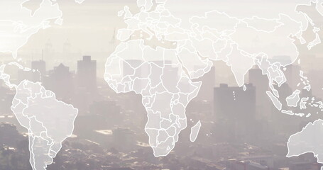 Displaying white world map outline spanning urban skyline under hazy smog with shipping cranes © vectorfusionart