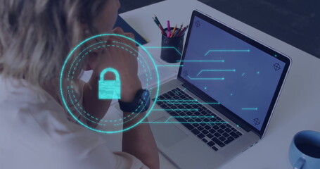 Pondering woman viewing laptop at desk with pencil holder, smartwatch and lock icon, copy space