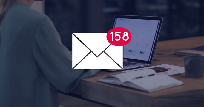 Displaying envelope icon signaling 158 unread alerts at office desk, with laptop charts coffee mug - Powered by Adobe