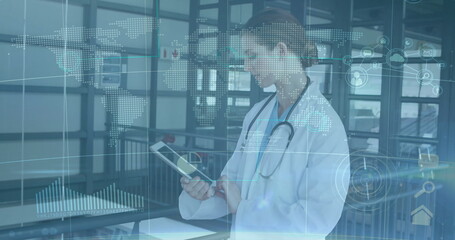 Holding female doctor analyzing holographic data overlays on tablet in clinic corridor, copy space