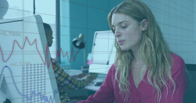 Woman wearing red blouse typing on keyboard in office, with sticky notes, chart overlay, copy space - Powered by Adobe
