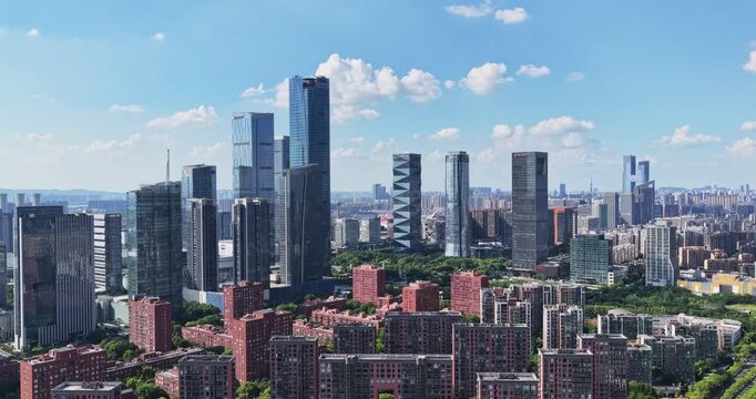 Aerial view of modern city with blue sky and clouds