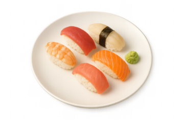 Plate presenting variety of delicious nigiri sushi with wasabi on transparent background