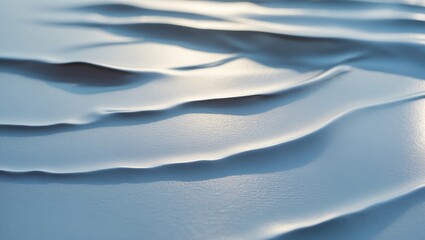 Obraz premium Snow dunes on a cold winter day, with smooth snow formations and gentle slopes. Cold weather and winter scenery. The concept of winter and snow landscapes.