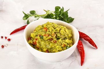 Guacamole with avocado, tomato and chili