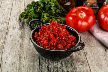 Diced ripe tomato with sauce