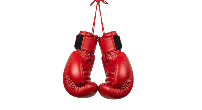 Red boxing gloves hang suspended