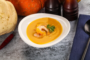 Pumpkin cream soup with prawns