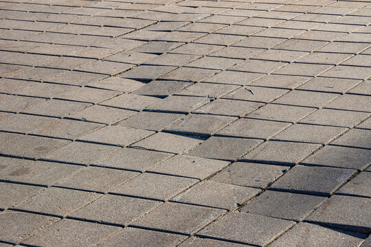 Damaged Paving Stones Caused by Groundwater Erosion and Lack of Drainage System