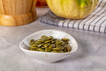 Fresh green pumpkin peeled seeds
