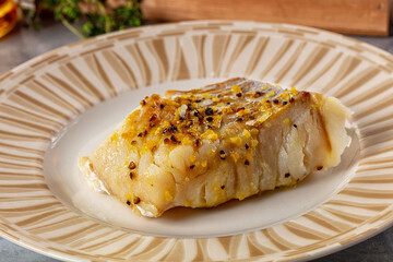 Steamed cod fish fillet with spices
