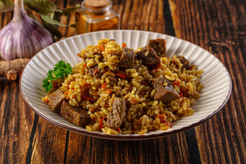 Asian traditional pilaf with beef