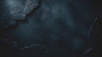 Dark surface with rough textures and uneven areas.