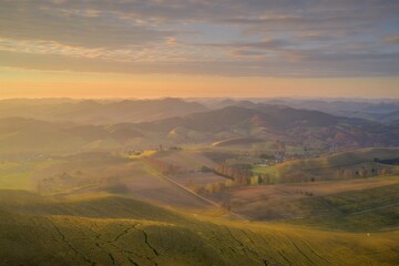 Aerial View of Rolling Hills Landscape at Sunset